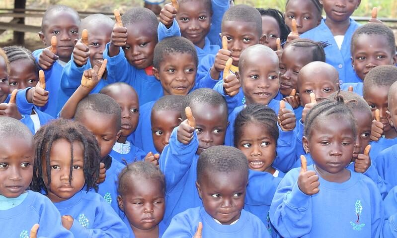 cropped-Africa-Uniform2.jpg Children from Freetown wearing their new uniform
